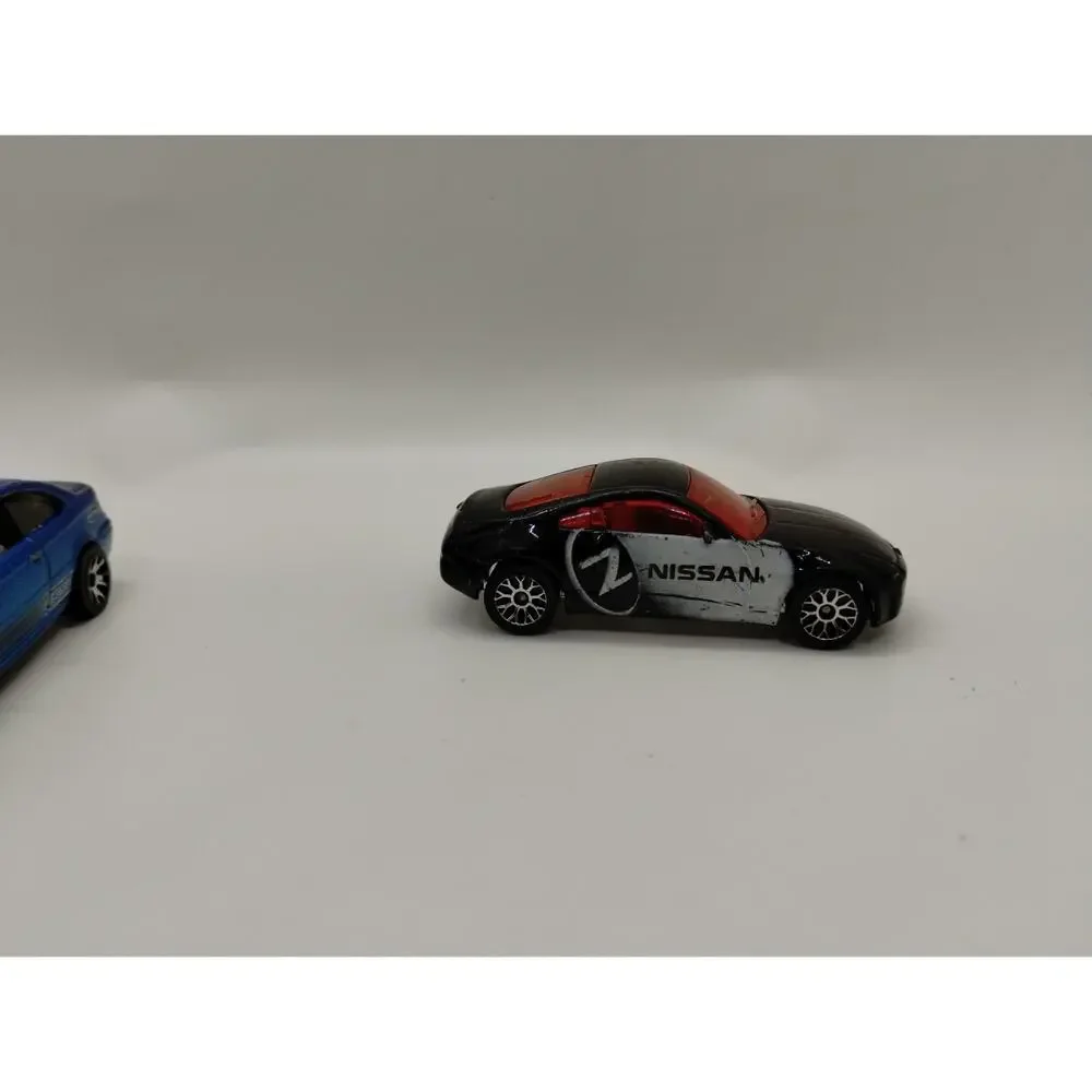 Lot of 7 Matchbox Diecast Cars - Ambulance - Nissan Z - Sahara Survivor